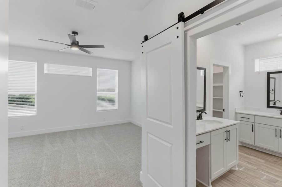 Spacious, unfurnished interior of a new home in Centero at Stone Oak, San Antonio (Image 33).