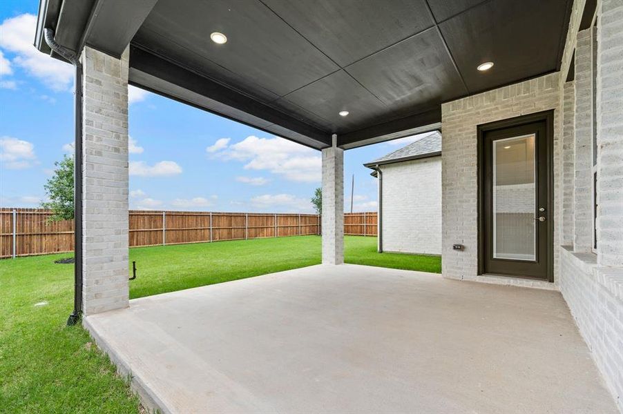 Exterior details and patio area of a home in Wildflower Ranch, Fort Worth (Image 27).