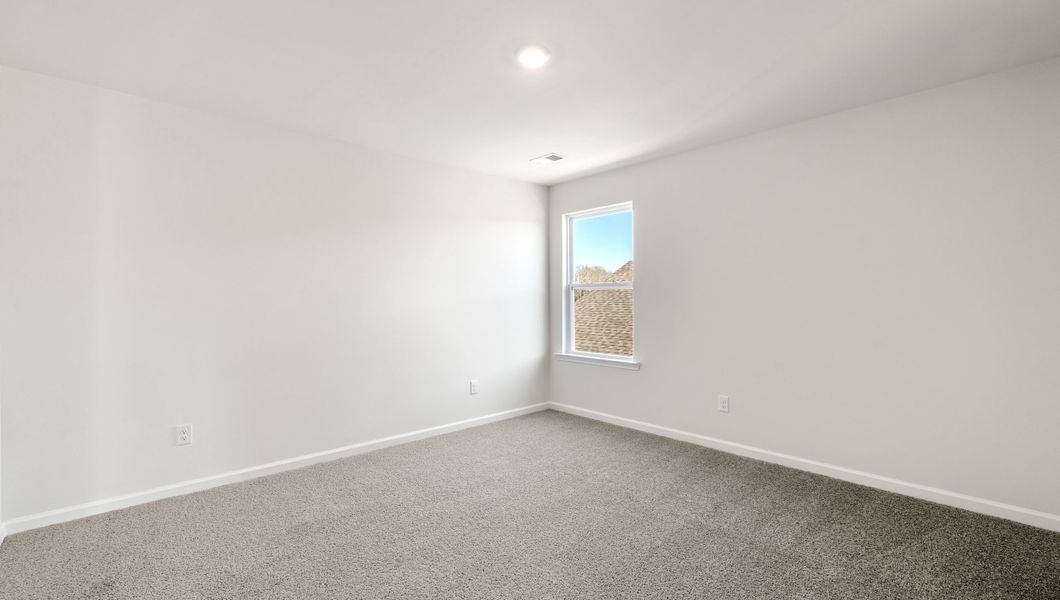 Representative unfurnished interior of a home built from the WILMINGTON by D.R. Horton in Benjamin's Grove, Woodruff (Image 26).