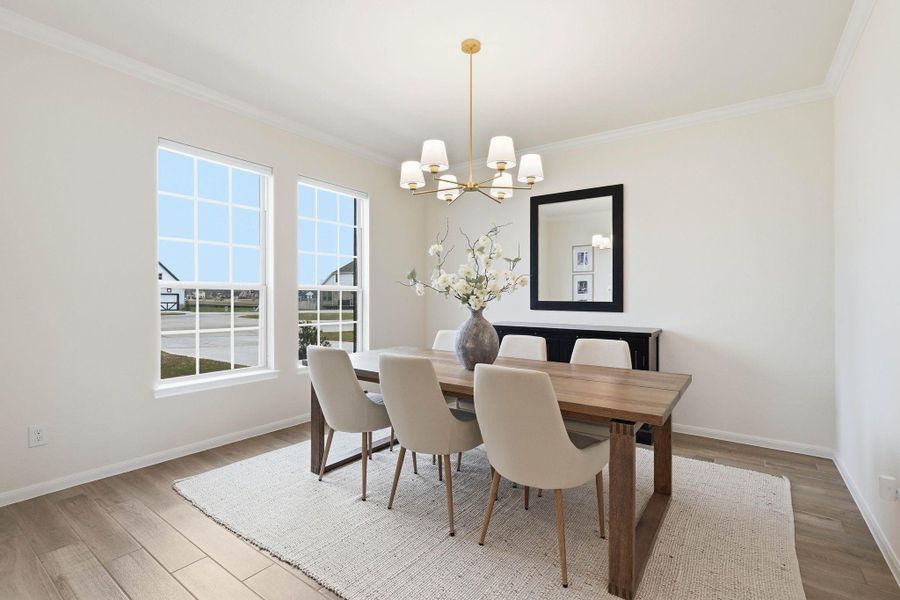 Formal dining to the L of the entryway.