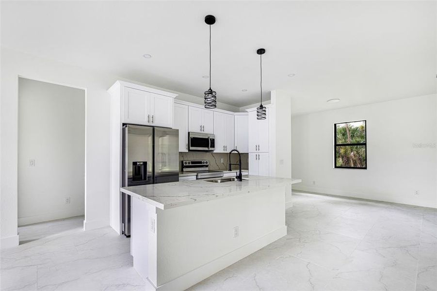 Furnished interior view inside a new home in , Port Charlotte (Image 10).