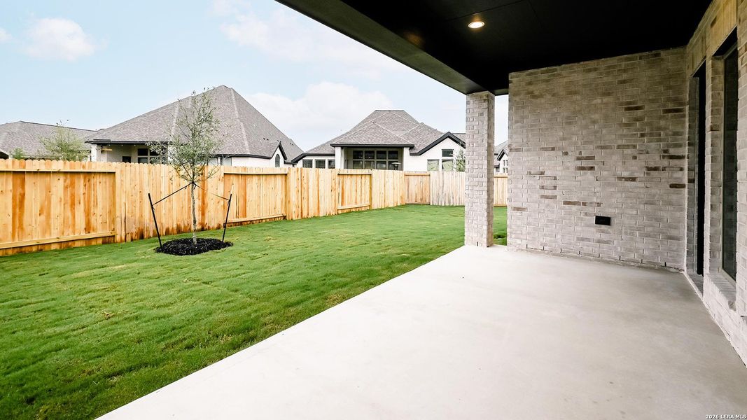 Exterior details and patio area of a home in Meadows of Mill Creek, Seguin (Image 4). Exterior details and patio area of a home in Meadows of Mill Creek, Seguin (Image 4).
