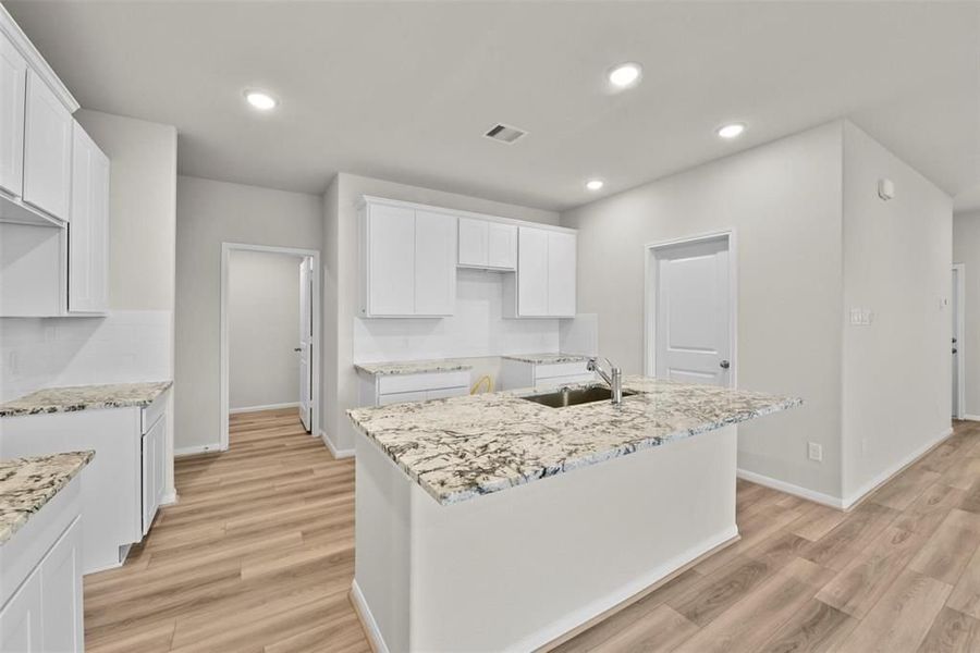 Furnished interior view inside a new home in Sunterra, Katy (Image 13). Furnished interior view inside a new home in Sunterra, Katy (Image 13).