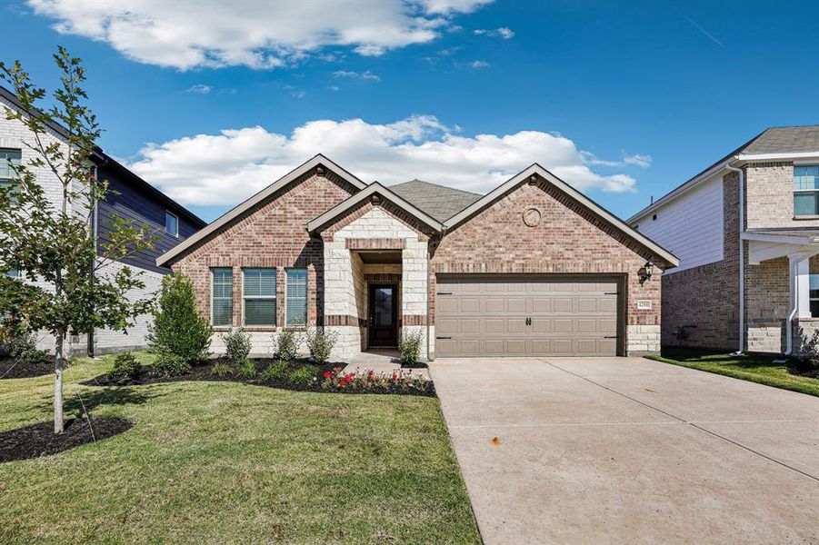 Front exterior of a new home in Lakehaven - Signature Series, Farmersville, TX, highlighting curb appeal (Image 2).