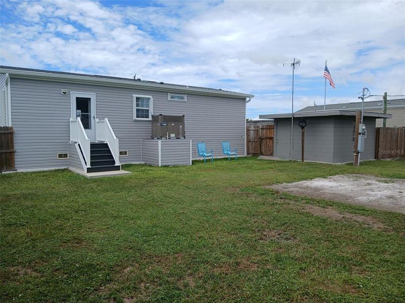 Exterior details and patio area of a home in , Englewood (Image 1).