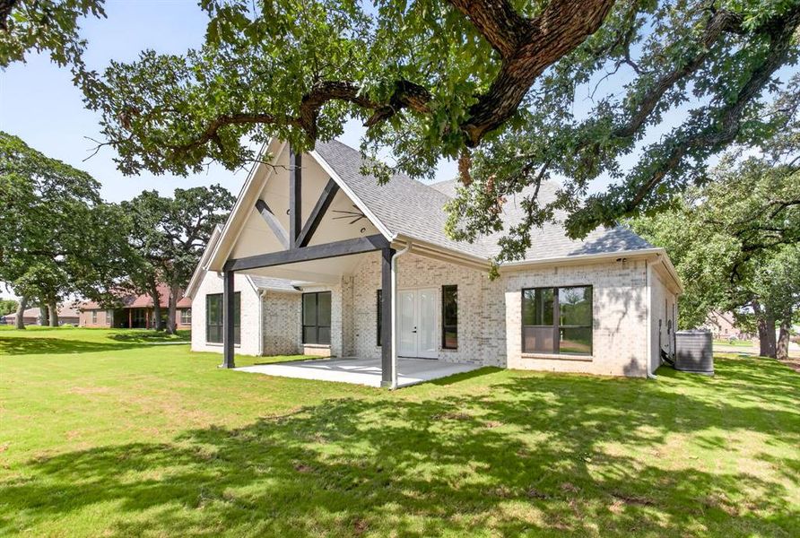 Front exterior of a new home in , Azle, TX, highlighting curb appeal (Image 25). Front exterior of a new home in , Azle, TX, highlighting curb appeal (Image 25).