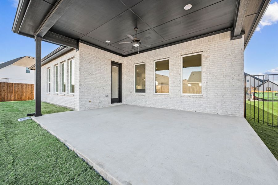 Exterior details and patio area of a home in Parks of Aledo, Aledo (Image 26).