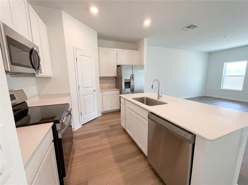 Furnished interior view inside a new home in Grand Park, Dunnellon (Image 6).