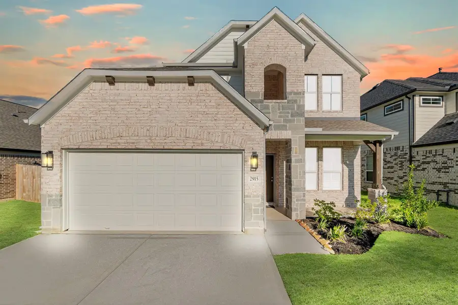 Front exterior of a new home in Morton Creek Ranch, Katy, TX, highlighting curb appeal (Image 2).