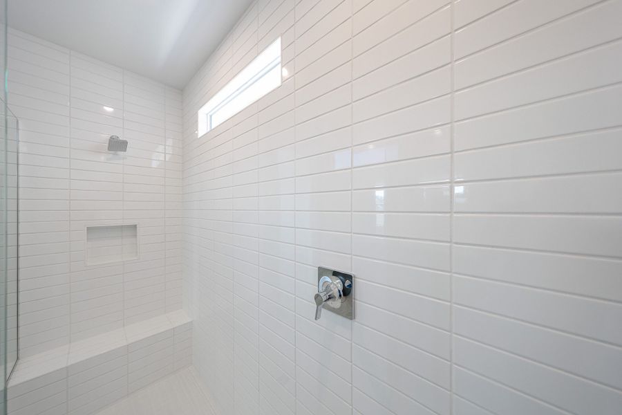 A white tiled wall.