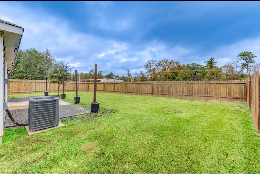 Exterior details and patio area of a home in Williams Trace, Magnolia (Image 28).