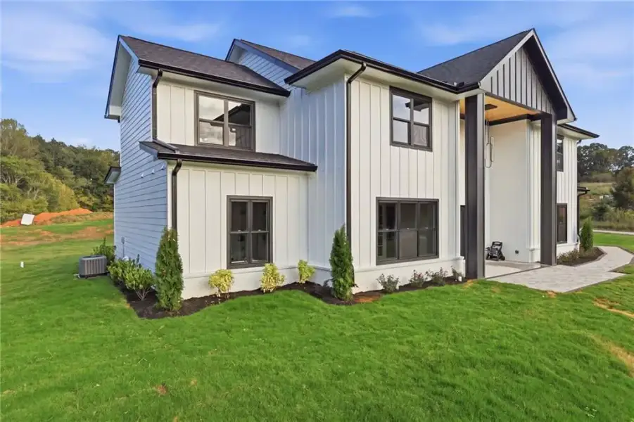 Front exterior of a new home in , Cumming, GA, highlighting curb appeal (Image 30).