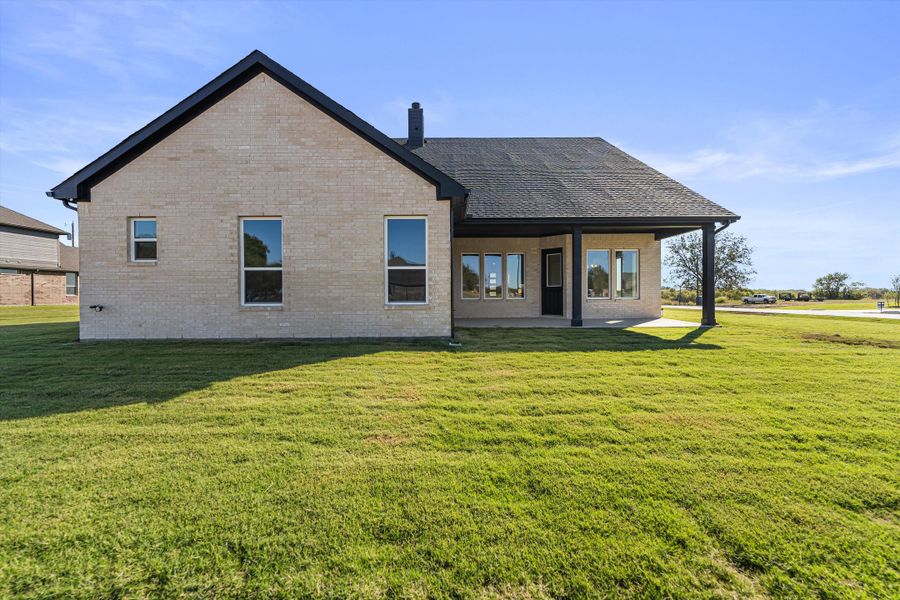 Exterior details and patio area of a home in Fannin Ranch, Leonard (Image 24).