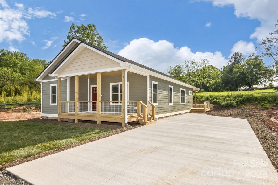 Front exterior of a new home in , Clyde, NC, highlighting curb appeal (Image 2). Front exterior of a new home in , Clyde, NC, highlighting curb appeal (Image 2).