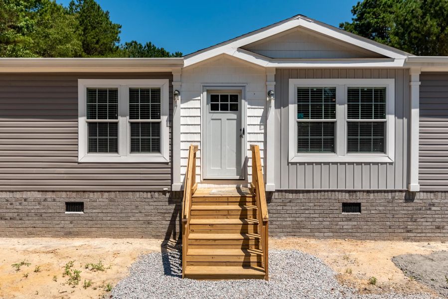 Exterior details and patio area of a home in , Pineville (Image 21). Exterior details and patio area of a home in , Pineville (Image 21).