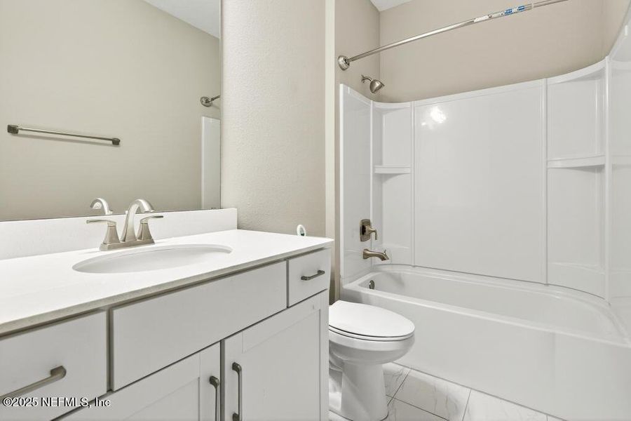 Furnished interior view inside a new home in Silver Landing at SilverLeaf, St. Augustine (Image 34).