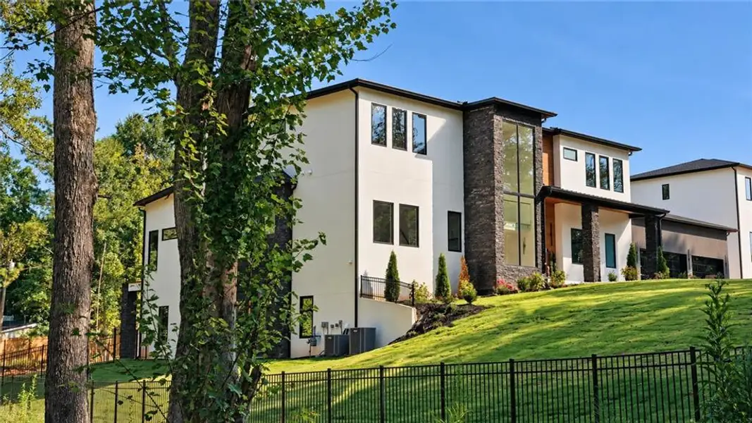 Front exterior of a new home in , Auburn, GA, highlighting curb appeal (Image 30).