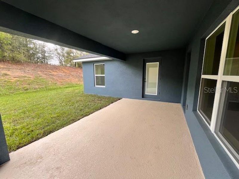 Exterior details and patio area of a home in Abbey Glen, Dade City (Image 4). Exterior details and patio area of a home in Abbey Glen, Dade City (Image 4).