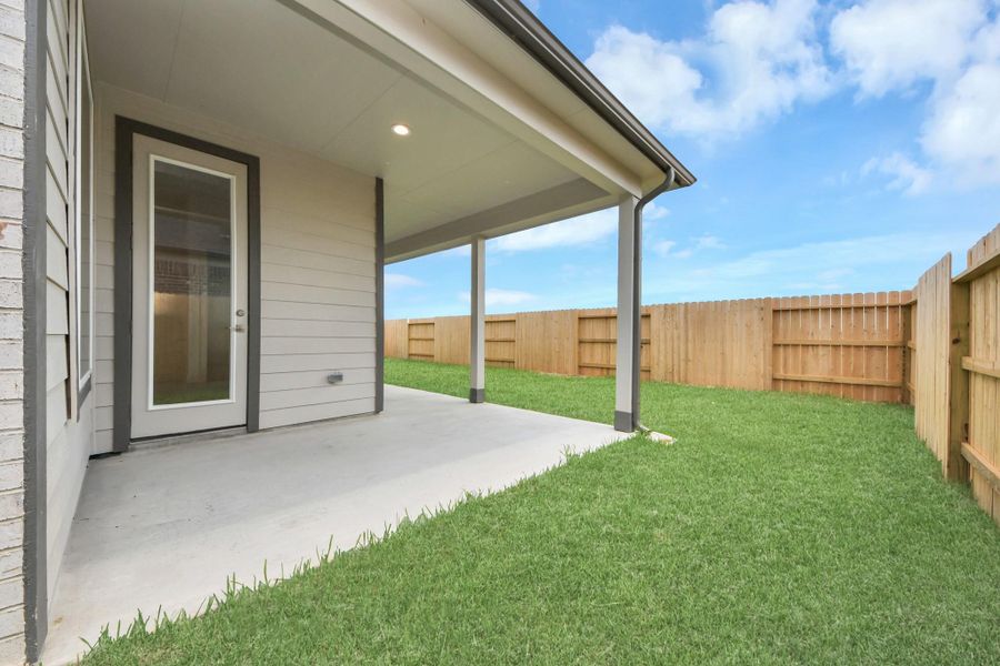 Experience outdoor living at its finest on this expansive covered patio, thoughtfully designed for BBQs and delightful outdoor dining. Experience outdoor living at its finest on this expansive covered patio, thoughtfully designed for BBQs and delightful outdoor dining.
