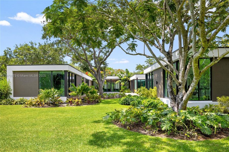Front exterior of a new home in , Pinecrest, FL, highlighting curb appeal (Image 34).