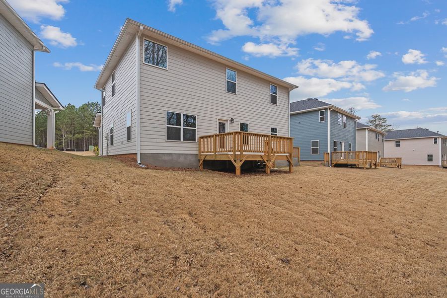 Exterior details and patio area of a home in Canterbury Villas, Carrollton (Image 20).
