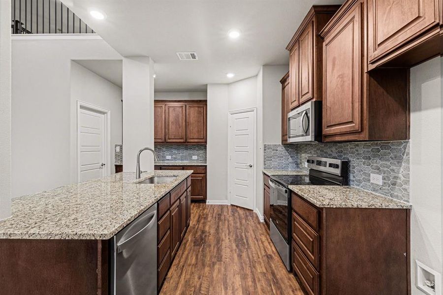 Furnished interior view inside a new home in Courts Of Bonnie Brae, Denton (Image 8).