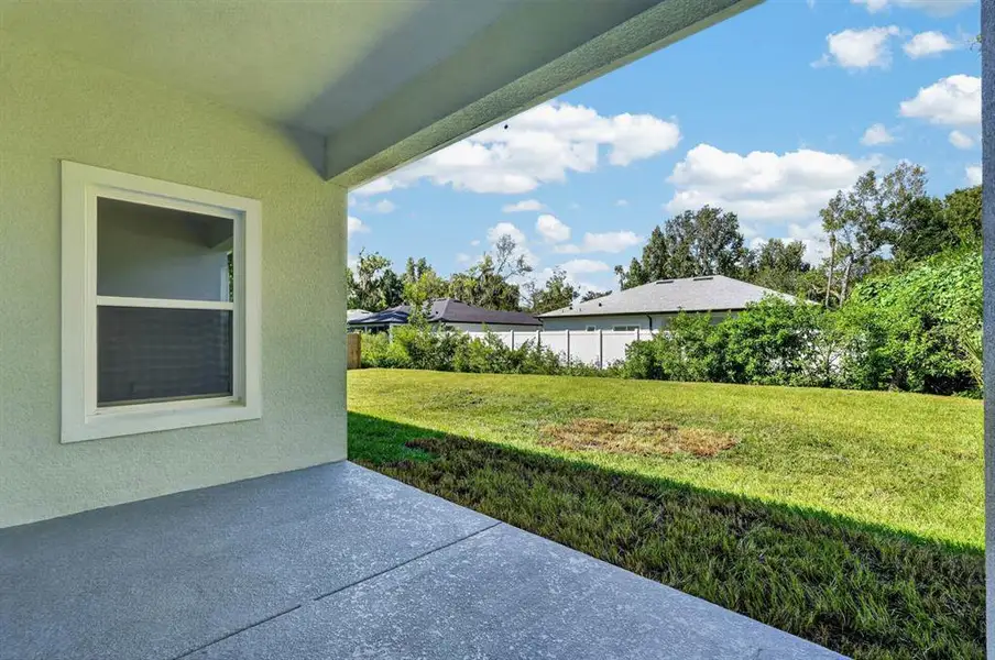 Exterior details and patio area of a home in , New Smyrna Beach (Image 3).