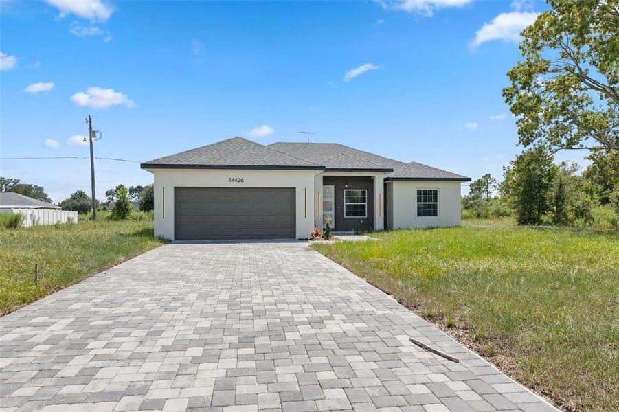 Front exterior of a new home in , Ocala, FL, highlighting curb appeal (Image 18). Front exterior of a new home in , Ocala, FL, highlighting curb appeal (Image 18).