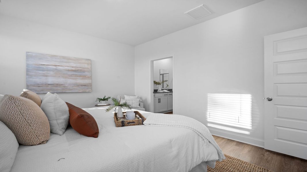 Furnished interior view inside a new home in The Lakes at North Glynn, Brunswick (Image 14).