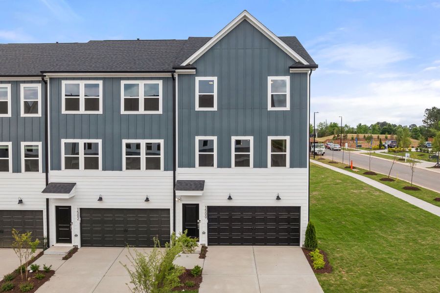 Front exterior of a new home in Everton, Durham, NC, highlighting curb appeal (Image 1). Front exterior of a new home in Everton, Durham, NC, highlighting curb appeal (Image 1).