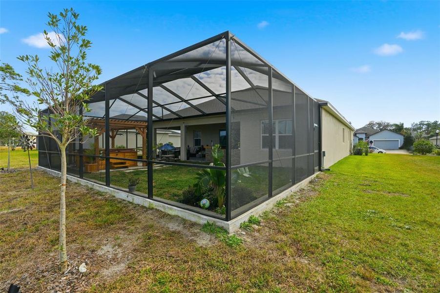 Exterior details and patio area of a home in , Weeki Wachee (Image 28).