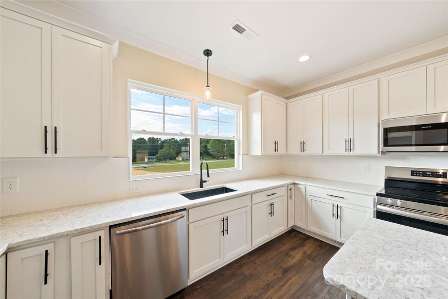 Furnished interior view inside a new home in , Monroe (Image 8).