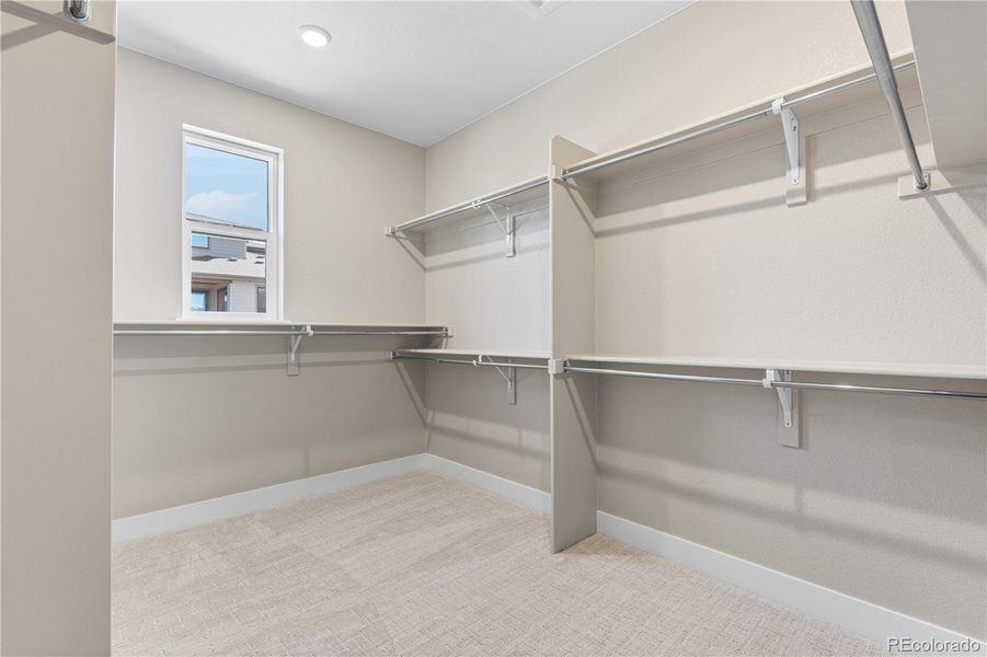 Spacious, unfurnished interior of a new home in Legends at Lyric, Lone Tree (Image 20).