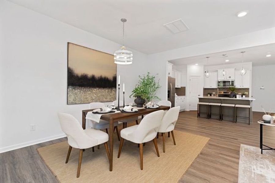 Representative furnished interior of a home built from the Alexandria TH by True Homes in Covington Ridge Townhomes, Thomasville (Image 11).