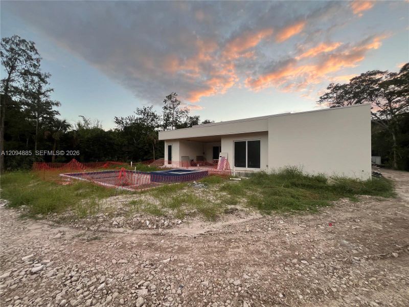 Exterior details and patio area of a home in , Parkland (Image 11).