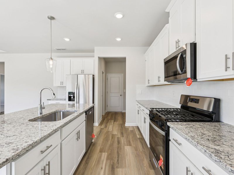 Furnished interior view inside a new home in Moss Farms, Lula (Image 6).
