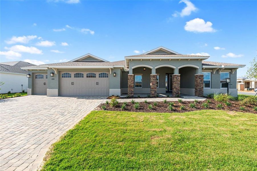Front exterior of a new home in , Ocala, FL, highlighting curb appeal (Image 31). Front exterior of a new home in , Ocala, FL, highlighting curb appeal (Image 31).