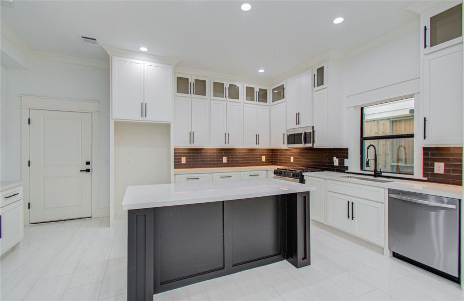 Sink features a window above for natural lighting.