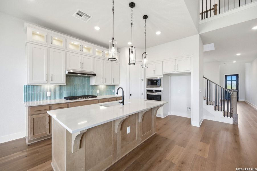 Furnished interior view inside a new home in VIDA, San Antonio (Image 7).
