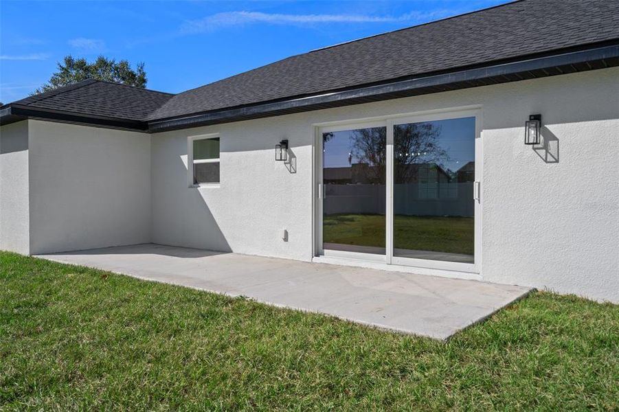 Exterior details and patio area of a home in , Spring Hill (Image 4). Exterior details and patio area of a home in , Spring Hill (Image 4).
