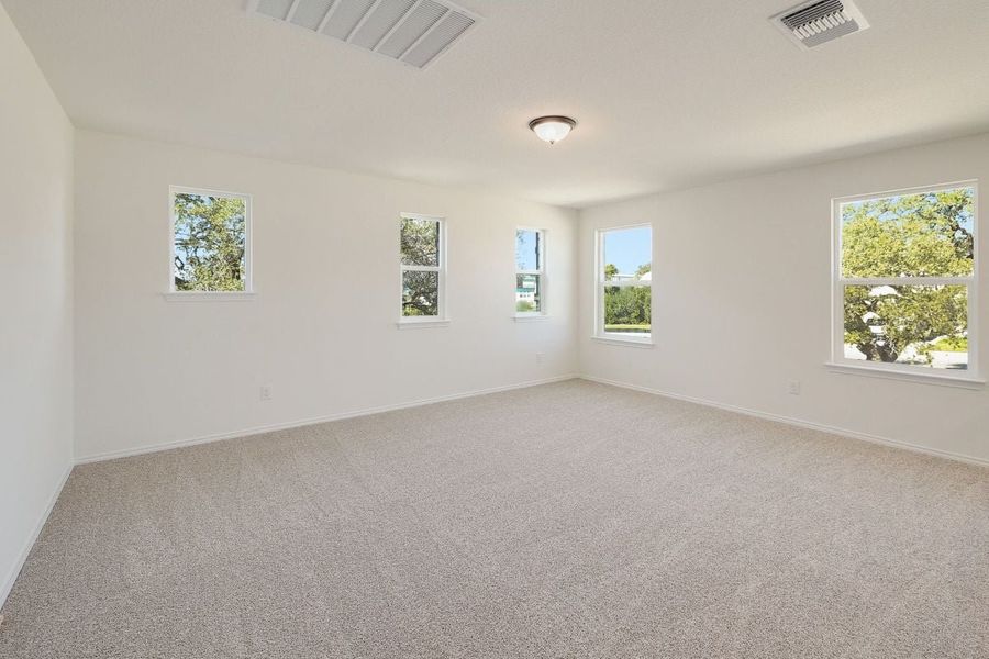 Spacious, unfurnished interior of a new home in River Bluff, Leander (Image 8).