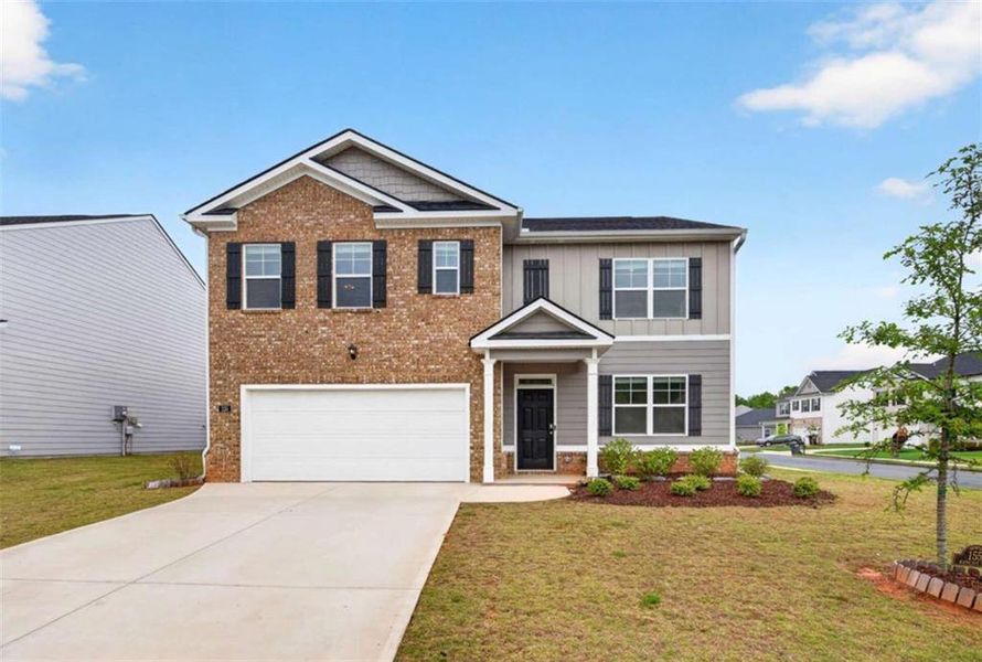 Front exterior of a new home in Bailey Glynn, Covington, GA, highlighting curb appeal (Image 19).