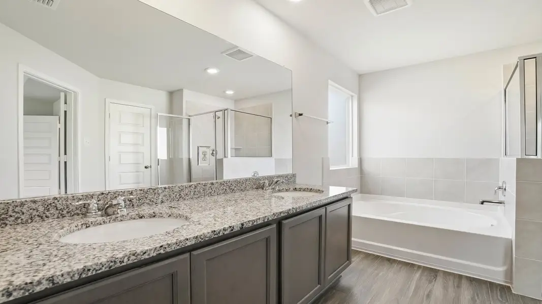 Furnished interior view inside a new home in Hunters Ranch, San Antonio (Image 9).