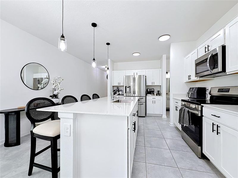 Furnished interior view inside a new home in Peace Creek Reserve, Winter Haven (Image 5). Furnished interior view inside a new home in Peace Creek Reserve, Winter Haven (Image 5).