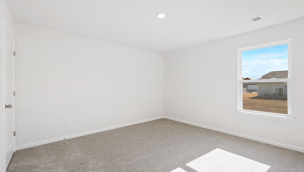 Spacious, unfurnished interior of a new home in Magnolia at the Bluffs Phase 3, Freeport (Image 24).