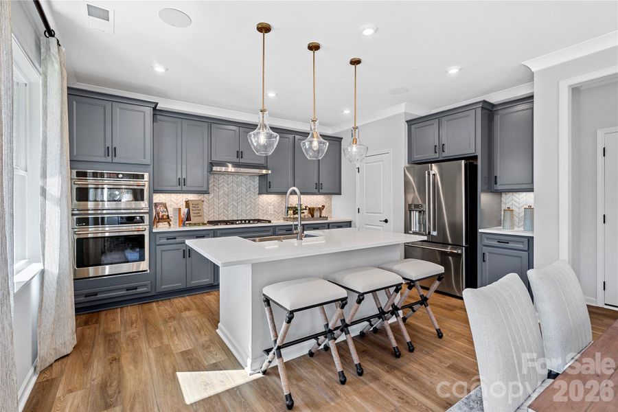 Gourmet kitchen layout and modern furnishings. Gourmet kitchen layout and modern furnishings.