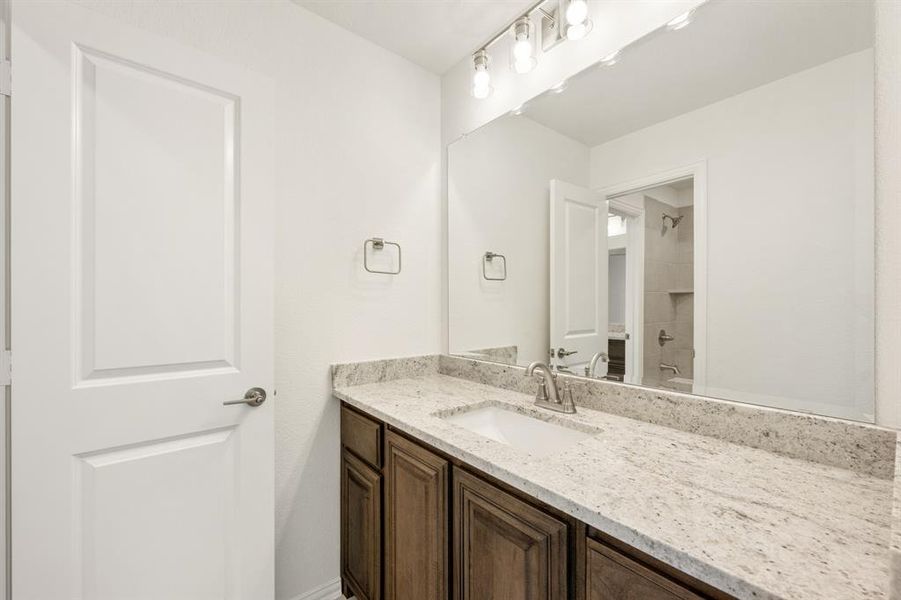 Furnished interior view inside a new home in Country Lakes, Denton (Image 11).