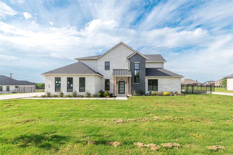 Front exterior of a new home in , Weston, TX, highlighting curb appeal (Image 1). Front exterior of a new home in , Weston, TX, highlighting curb appeal (Image 1).
