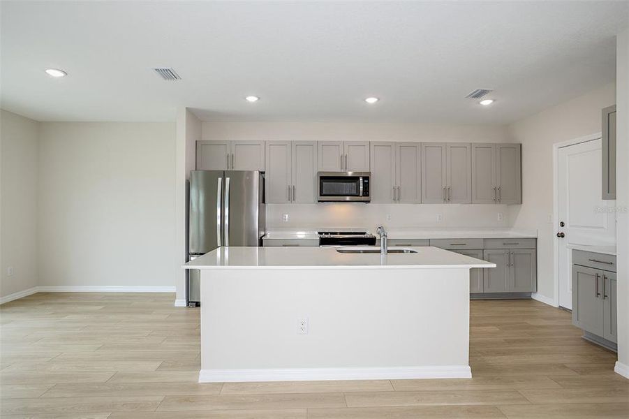 Furnished interior view inside a new home in Pasadena Ridge, Dade City (Image 6).