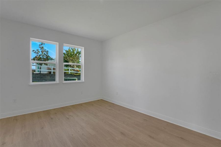 Spacious, unfurnished interior of a new home in Green Key Village, Lady Lake (Image 24).
